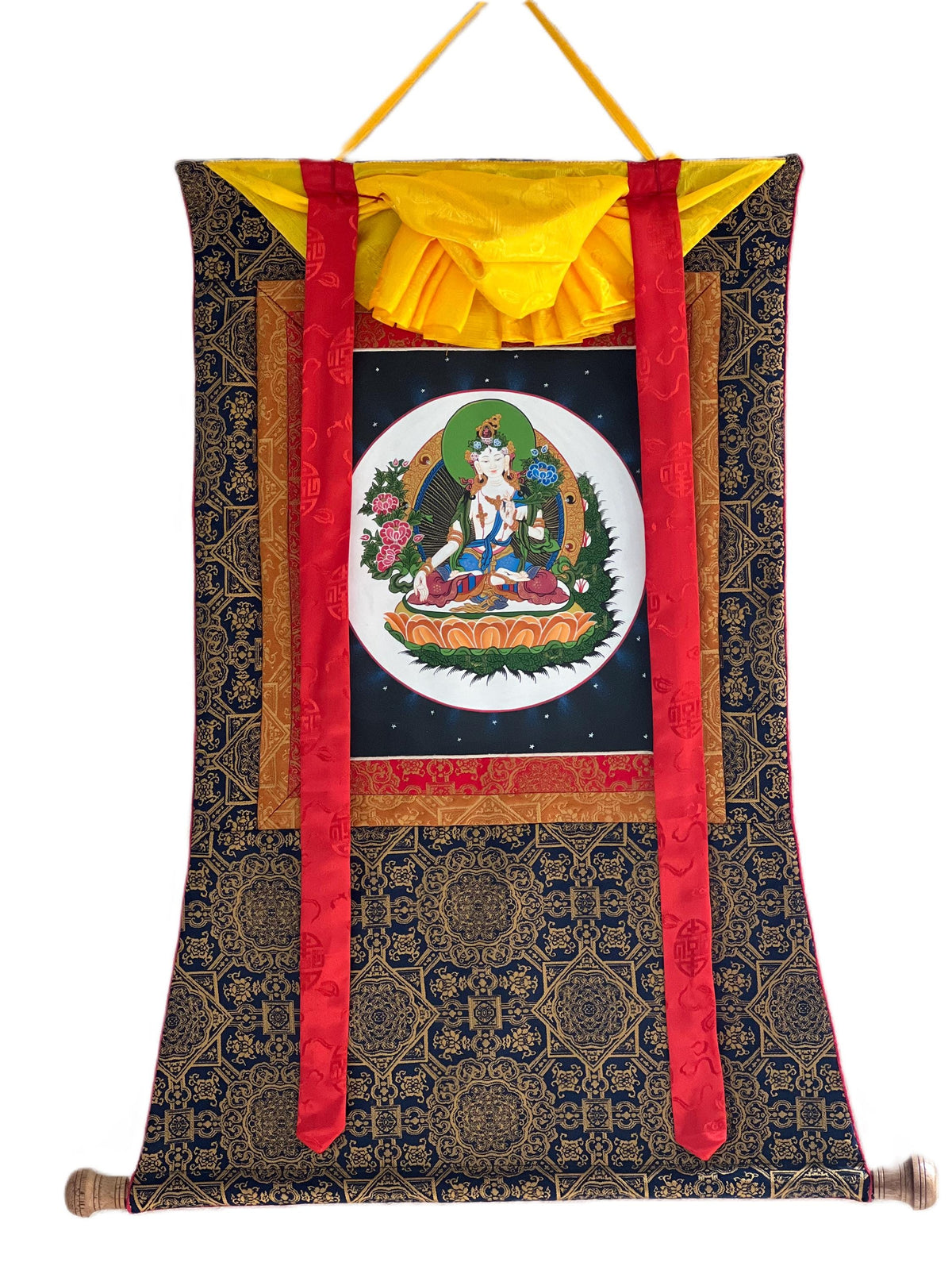 May include: Tibetan Thangka painting on silk depicting a serene Buddha figure in a circular frame, surrounded by floral motifs. The artwork is mounted on a dark blue and gold brocade scroll with red silk accents. The scroll features intricate geometric patterns and auspicious symbols.  The Thangka is a traditional form of Buddhist art, often used for meditation and prayer.