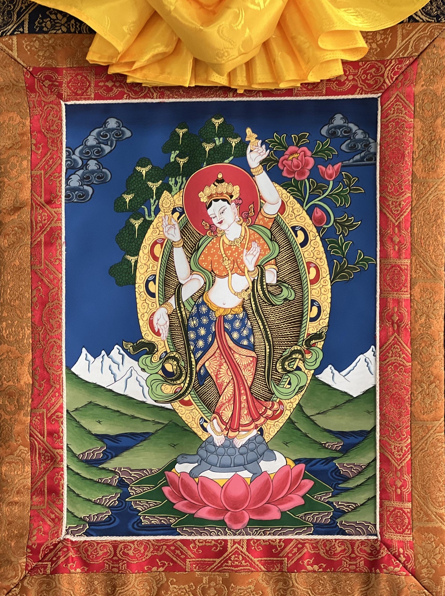 Hand-Painted Goddess Lakshmi Thangka – Nepalese Hindu Art with Silk Border