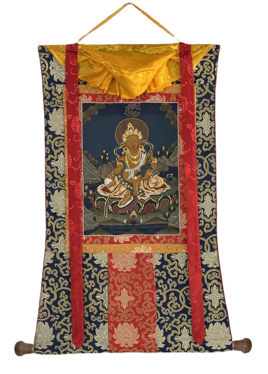 Yellow Dzambhala Kubera Thangka | Hand-Painted Tibetan Wealth Deity with Silk Brocade